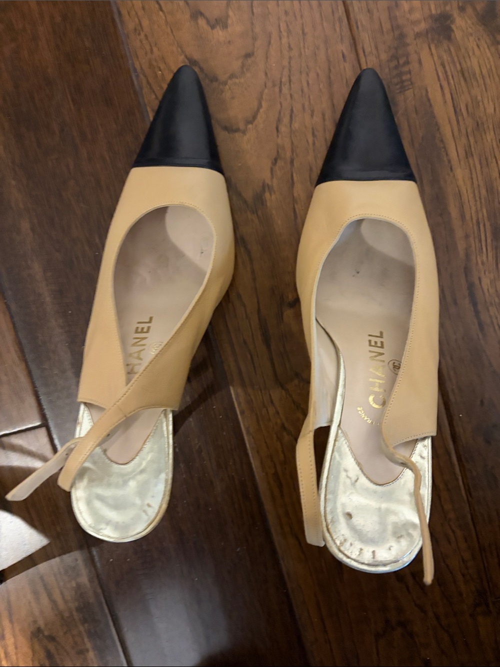 CHANEL Beige Leather Slingback Mules with Black Pointed Toe
